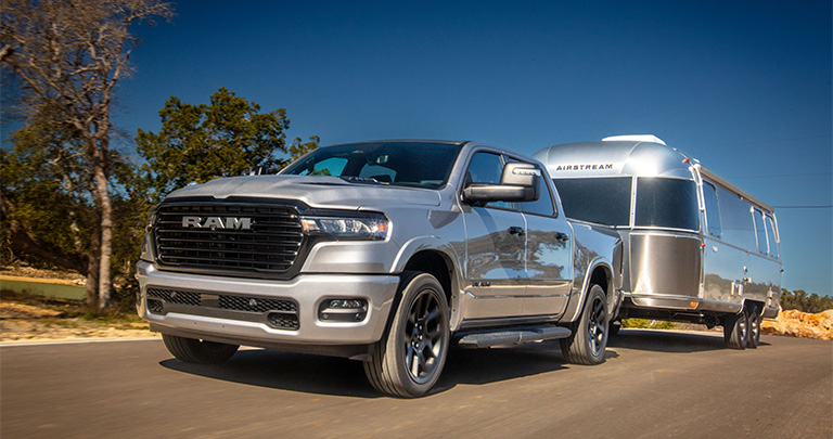 2025 RAM 1500 with tractor near Randolph, NY